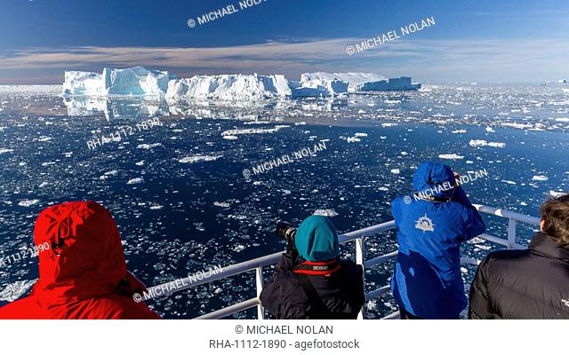 The National Gepographic Explorer amongst huge icebergs calved from the Ilulissat Glacier, UNESCO World Heritage Site, Ilulissat, Greenland, Polar Regions