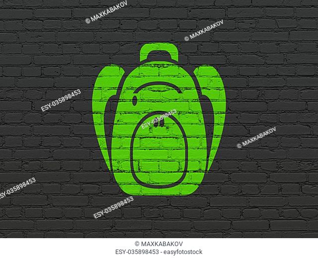 Learning concept: Backpack on wall background
