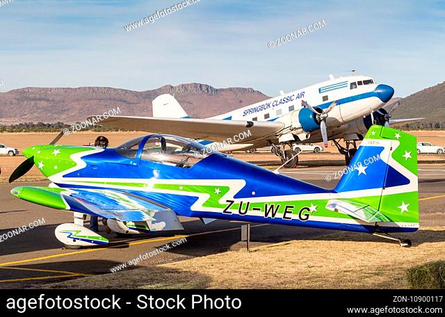 QUEENSTOWN, SOUTH AFRICA - 17 June 2017: Van's Aircraft RV7 and Douglas DC-3 Dakota parked at air show exhibition