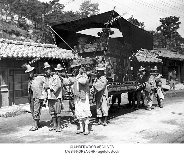 Seoul, South Korea: June 28, 1947 A native Korean funeral procession which derives from a mixture of the religions of Buddhism and Confucianism
