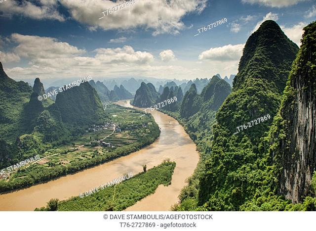 Boat traveling up the scenic Li River, Xingping, Guangxi Autonomous Region, China