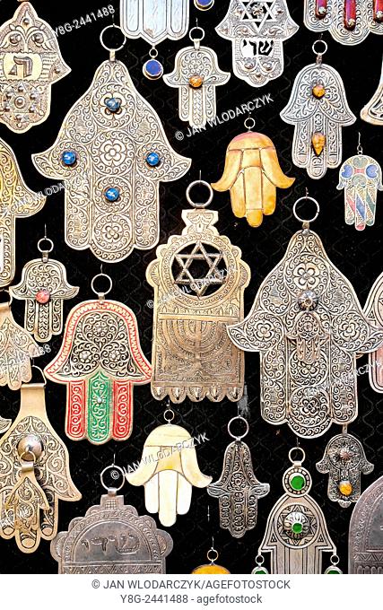 Silver and brass pendants, Hands of Fatima, good luck charms in a souvenir shop. Morocco