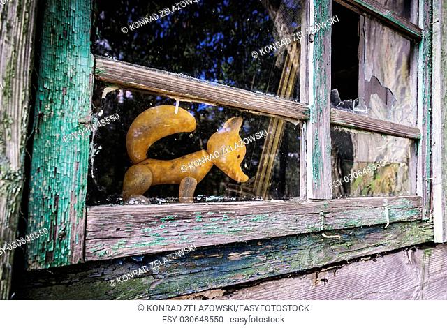 Plastic toy in abandoned house in Mashevo village of Chernobyl Nuclear Power Plant Zone of Alienation area around nuclear reactor disaster in Ukraine