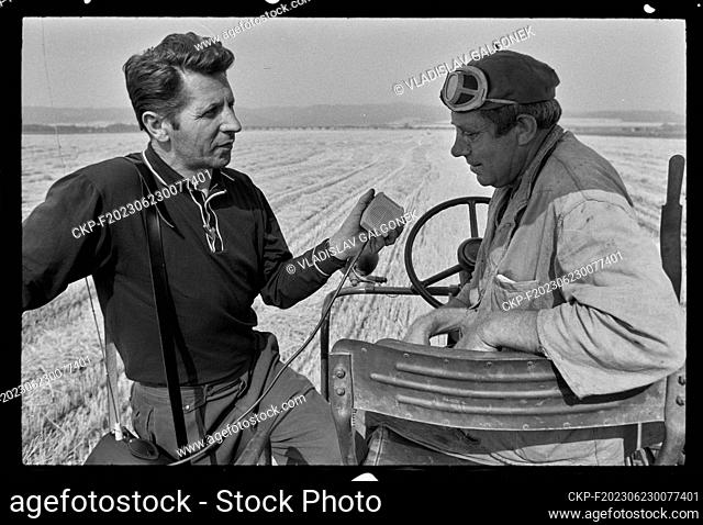 ***AUGUST 6, 1974 FILE PHOTO***Combine harvester operator Vlastimil Ctvrlik (right) and Vaclav Nestipil ""Under Jedova"" Unified Agricltural Cooperative in...