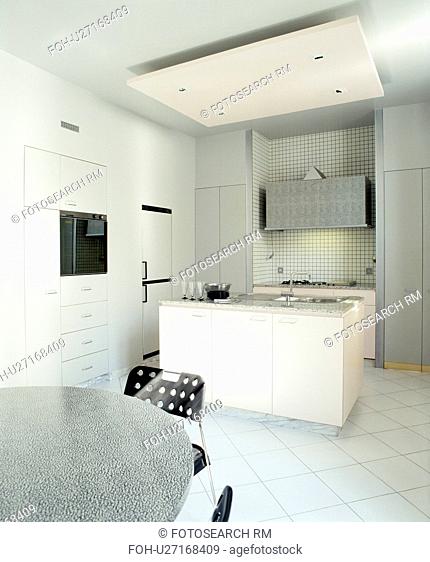 False ceiling above island unit in modern white kitchen with granite-topped table and white tiled floor