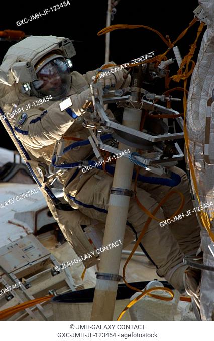 Russian cosmonaut Alexander Misurkin, Expedition 36 flight engineer, participates in a session of extravehicular activity (EVA) as work continues on the...