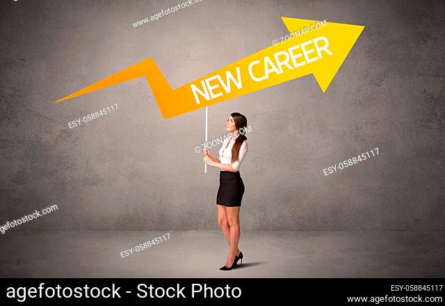 Young business person in casual holding road sign with NEW CAREER inscription, business direction concept