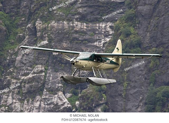 Flightseeing float planes in and out of the Punchbowl rock formation in Kynoch Inlet in Misty Fjords National Monument in Southeast Alaska, USA