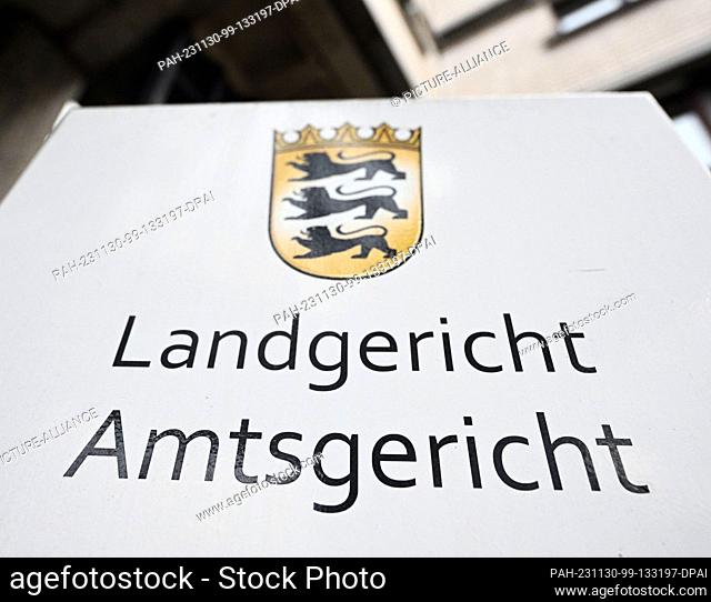 30 November 2023, Baden-Württemberg, Baden-Baden: A sign with the inscription ""Landgericht Amtsgericht"" taken at the court