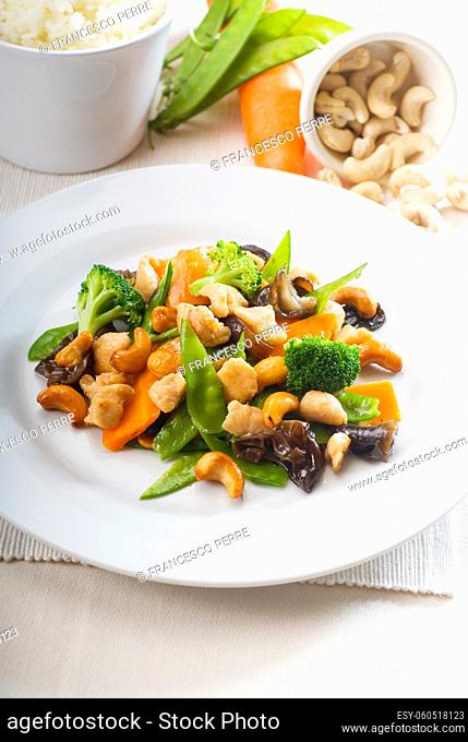fresh chicken and vegetables stir fried with cashew nuts, typical chinese dish