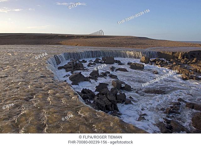 Major breach in shingle defence sea wall after December 2013 tidal surge, Salthouse, Norfolk, England, January