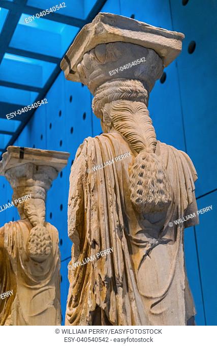 Original Caryatid Ruins Temple of Erechtheion Acropolis Acropolis Museum Athens Greece. Greek maidens columns Temple of Erechtheion for a former Athenian king