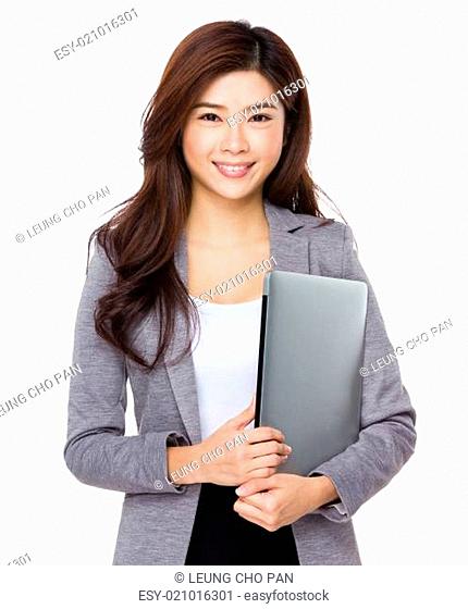 Young asian businesswoman hold with notebook computer