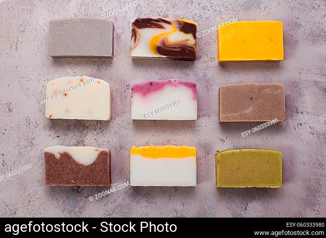 Flat lay composition with handmade soap bars, top view. Healthy organic beauty products
