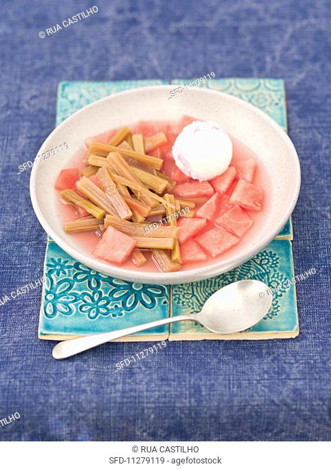 Cold watermelon and rhubarb soup with strawberry and vanilla ice cream