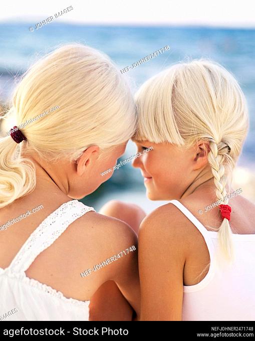 Two sisters on beach