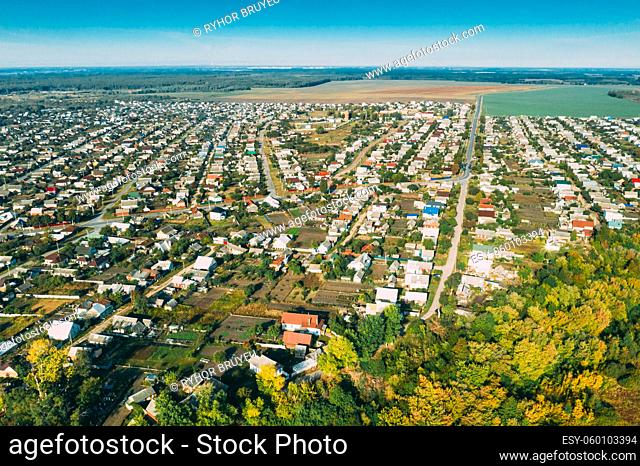 Dobrush, Gomel Region, Belarus. Aerial View Of Dobrush Cityscape Skyline In Summer Day. Residential District And River In Bird's-eye View