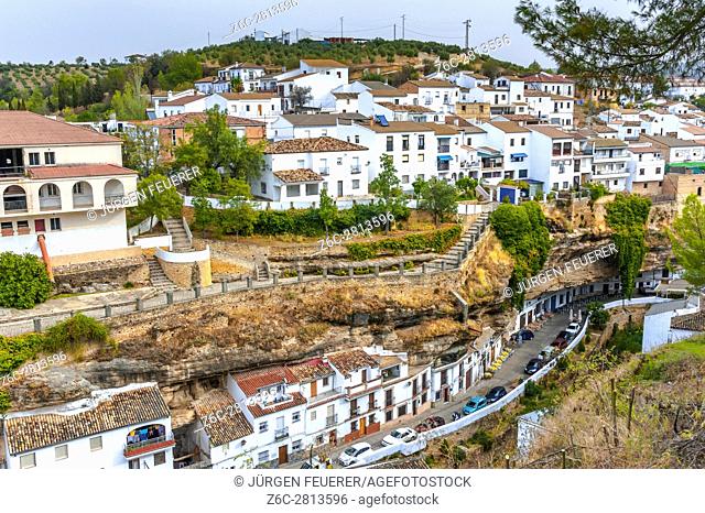 village Setenil de las Bodegas; white houses under rocks, province of Cádiz, Andalusia, Spain