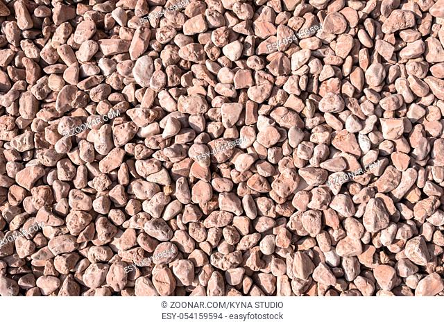 Closeup of little pink pebbles. It can be used for texture and background