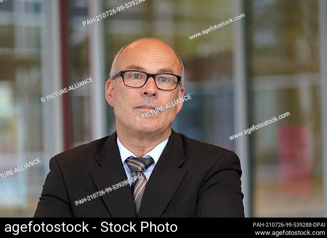 26 July 2021, Hamburg: Ties Rabe (SPD), Senator for Schools and Vocational Training in Hamburg, stands in front of the Helmuth Hübener district school