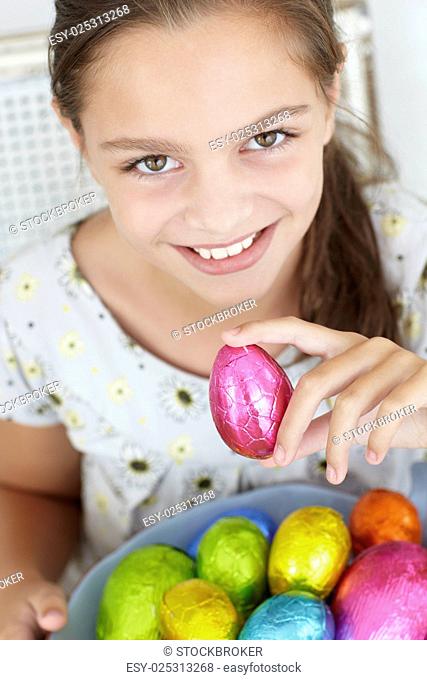 Young girl with Easter eggs