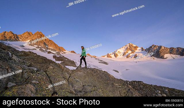 Evening mood, Alpine glow, Hiker in front of Glacier du Tour, Glacier and mountain peaks, High Alpine landscape, Tête Blanche