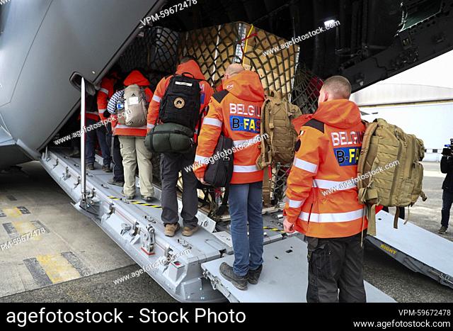 Illustration picture shows B-Fast aid workers boarding the airplane at the departure of a logistics team of the Belgian governmental aid organisation B-Fast...