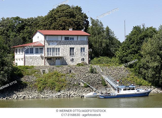 Mohacs, Hungary, Mohacs on the Danube, Transdanubia, Southern Transdanubia, Baranya county, residential building with boat mooring at the Danube bank
