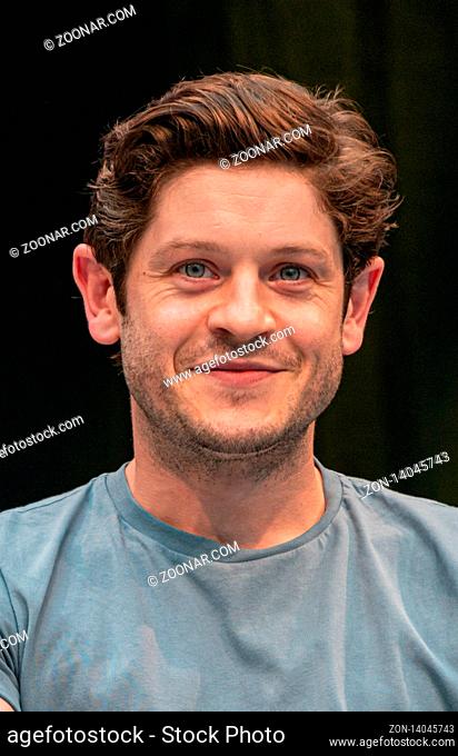 STUTTGART, GERMANY - JUN 29th 2019: Iwan Rheon (*1985, Welsh actor, singer and musician) talks about his experiences in the movie industry at Comic Con Germany...