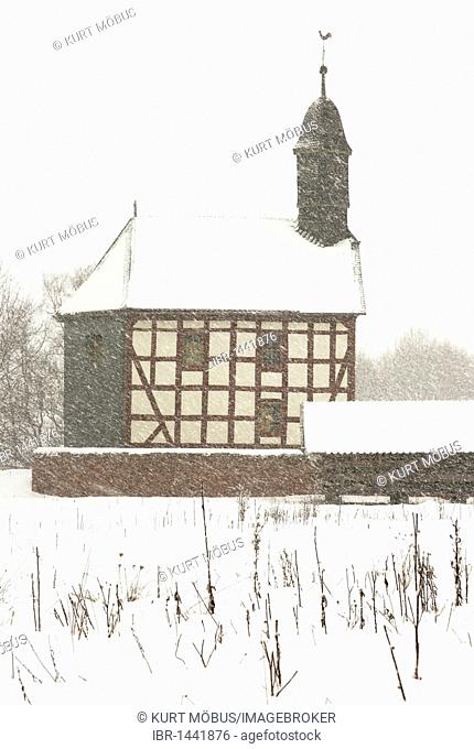Small village church in the thick snow, winter, winter in Hessenpark, Neu-Anspach, Taunus, Hesse, Germany, Europe