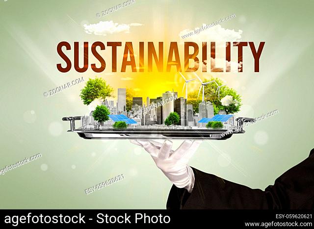 Waiter serving eco city with SUSTAINABILITY inscription, renewabke energy concept