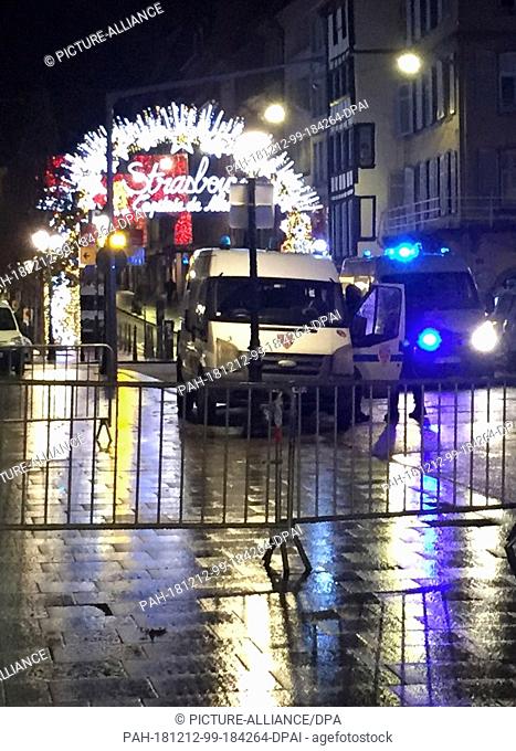 11 December 2018, France (France), Straßburg: Entrance Christmas market at the Pont du corbeau is blocked by the police. According to the prefecture