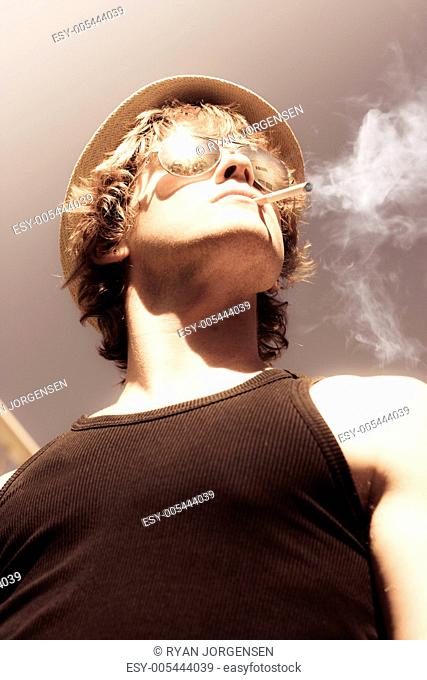 Male Glamour Model Smoking Tobaco