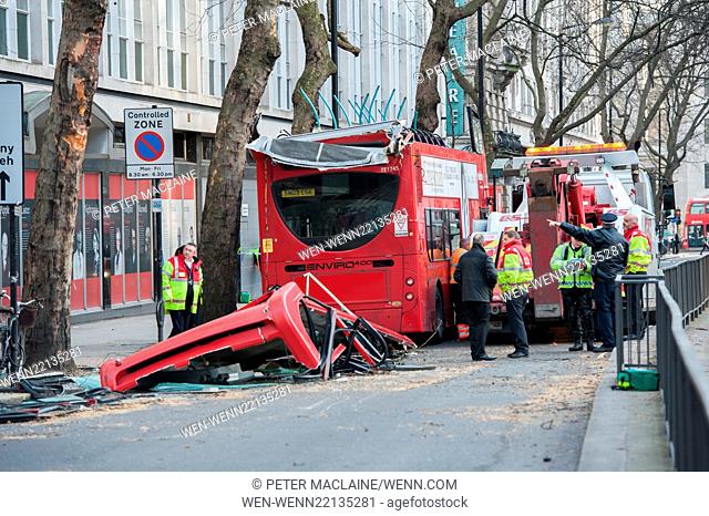 Emergency services at the scene after a bus hits a tree branch and loses its roof in Kingsway, Holborn. Featuring: View Where: London