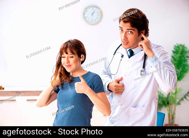 Patient with hearing problem visiting doctor otorhinolaryngologist
