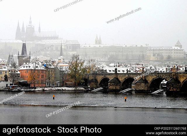 Snowfall in the centre of Prague, Czech Republic, on November 26, 2023. On the photo is seen Prague Castle with St. Vitus Cathedral over Vltava River