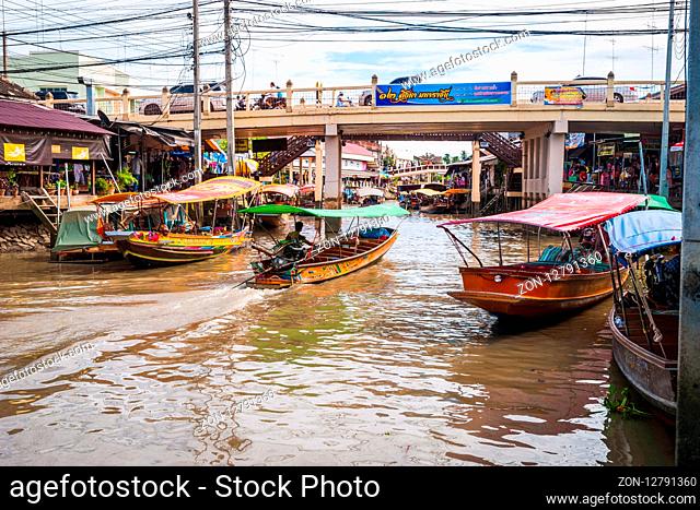 Amphawa, Thailand - Sep 13, 2015: Floating food market at Amphawa where food is cooked and prepared on the boats and serve to the people on the river canal bank