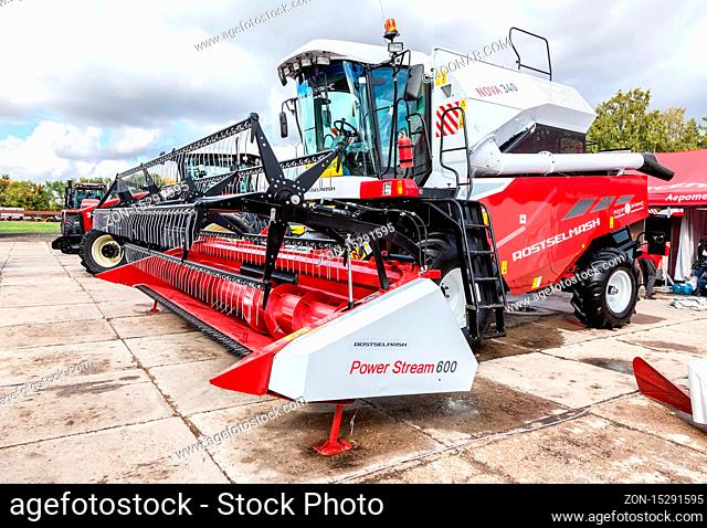 Samara, Russia - September 15, 2019: Modern agricultural machinery. Combine-harvester Rostselmash Nova 340 with reaping Power Stream 600