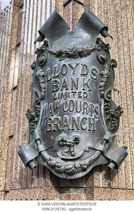 Lloyds bank Law Courts branch, vintage bronze sign, Strand, London, England, UK