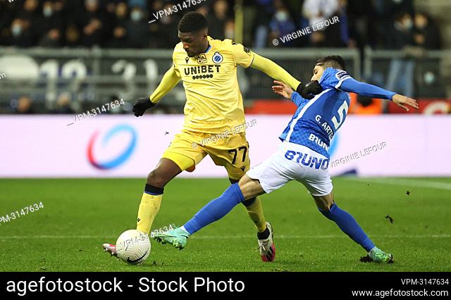 Club's Clinton Mata and Genk's Gerardo Arteaga fight for the ball during a soccer game between Racing Genk and Club Brugge, Wednesday 01 December 2021 in Genk