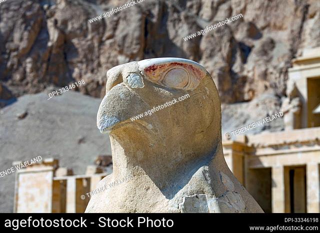 Close-up of the falcon statue, representing the Falcon-Headed God, Horus, in front of the Mortuary Temple of Hatshepsut at Deir al-Bahri on the West Bank of the...