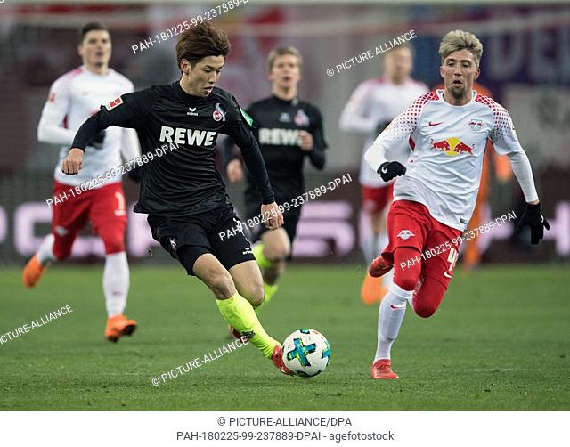 25 Febuary 2018, Germany, Leipzig: German Bundesliga soccer match between RB Leipzig and 1. FC Cologne, Red Bull Arena: Leipzig'sKevin Kampl (R) and Cologne's...
