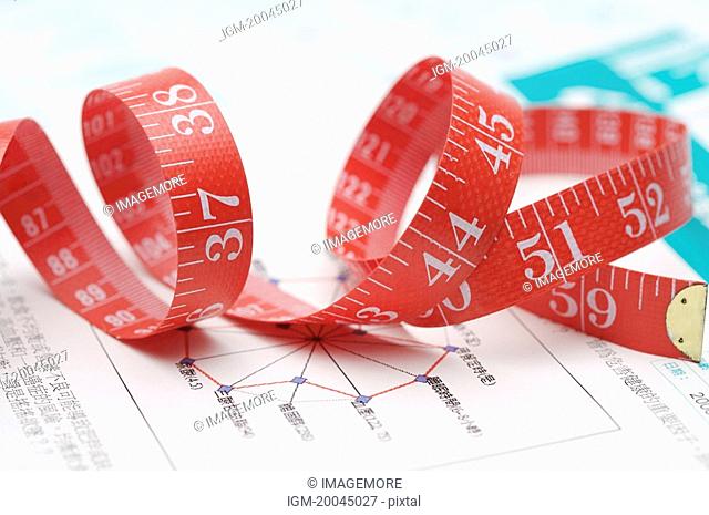 Close-up of a red tape measure
