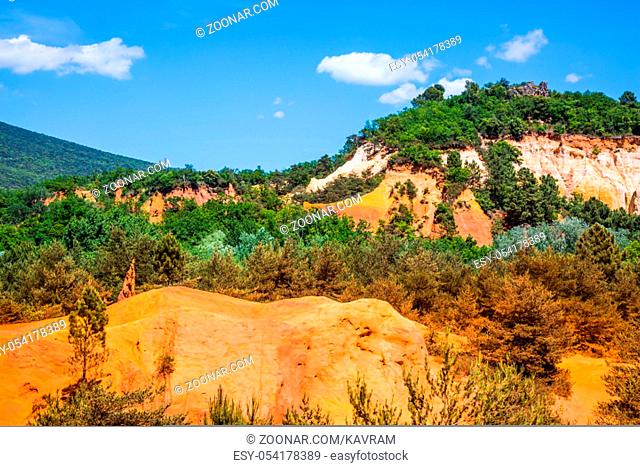 Languedoc - Roussillon, Provence, France. Reserve - quarry for ocher mining. Orange and red picturesque hills