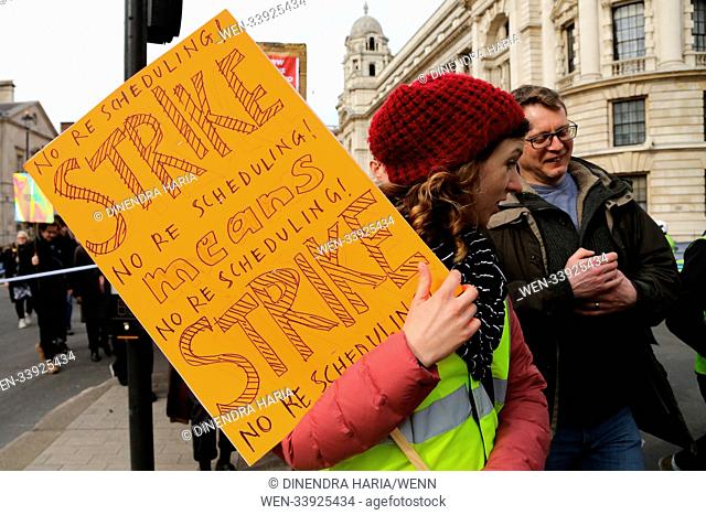 Hundreds of striking University lecturers and students march through Whitehall after turning down an agreement reached by university union leaders and employers...