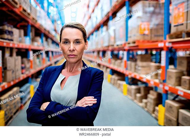 Portrait of warehouse manager standing