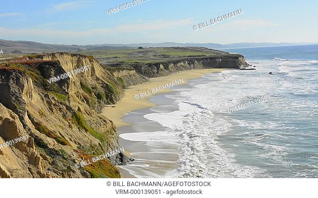 Half Moon Bay California shore ocean cliffs off of the Ritz Golf Course with waves sand at Half Moon Bay Golf Links