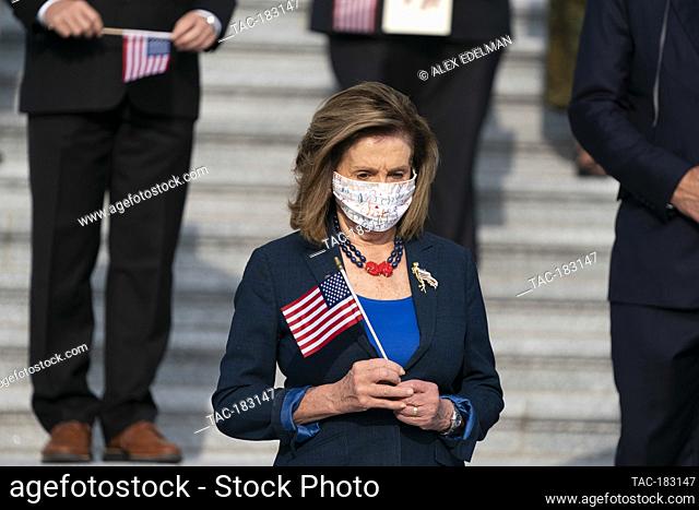 US House Speaker Nancy Pelosi, D-CA, participates in a moment of silence honoring the victims of the 9/11 terrorist attack outside the US Capitol Building on...
