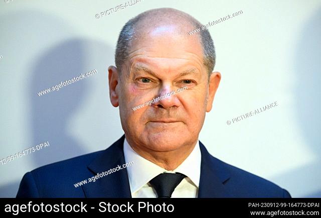 12 September 2023, Berlin: Chancellor Olaf Scholz (SPD) shows up at the International Meeting of the Christian Community of Sant'Egidio again without the eye...