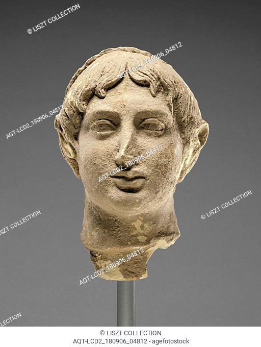 Head of a Male Banqueter; Tarentum (Taras), South Italy; 400 - 300 B.C; Terracotta with clay slip and polychromy (red color, ocher); 20.3 × 13